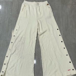 Soft boot legged high waisted dude button pants